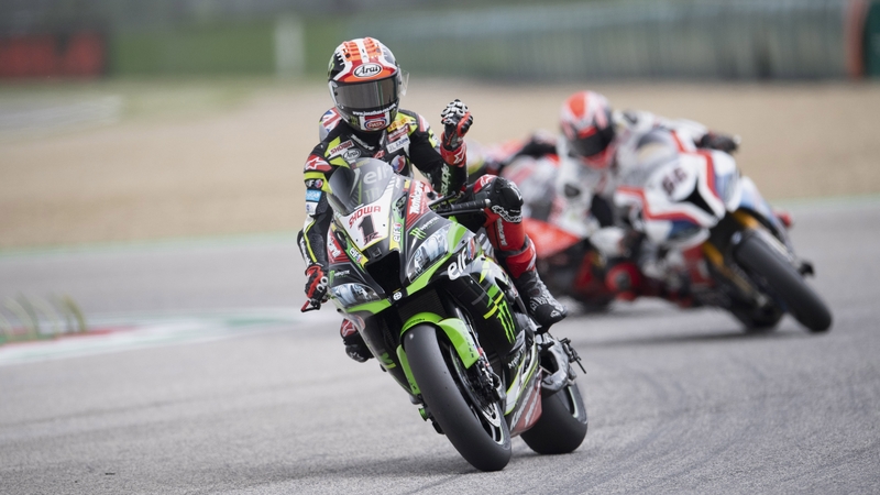 Jonathan Rea celebrates his victory at the iconic Imola track