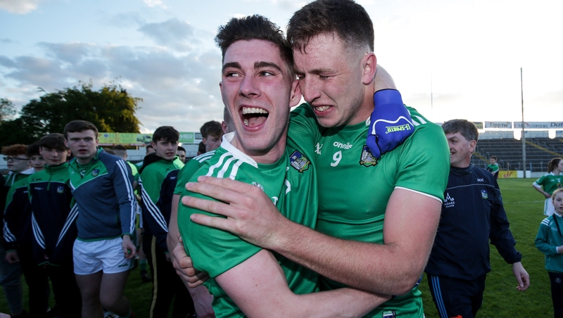 Paul Maher celebrates with Tommie Childs after the game