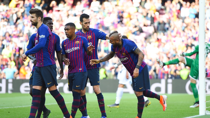 Arturo Vidal put Barca ahead on the stroke of half-time and a late own-goal sealed a hard-fought win for Barca