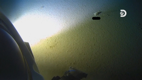 Rubbish, underlined in black, seen on the floor of the ocean (Courtesy: Atlantic Productions for Discovery Channel)