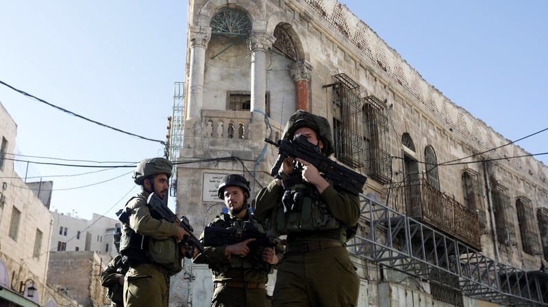 Israeli soldiers on patrol in Hebron