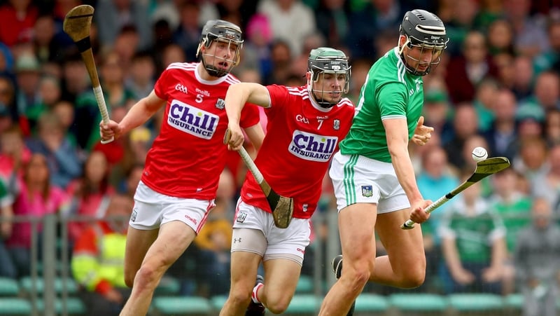 Mark Coleman gets a tackle in on Limerick's Gearoid Hegarty