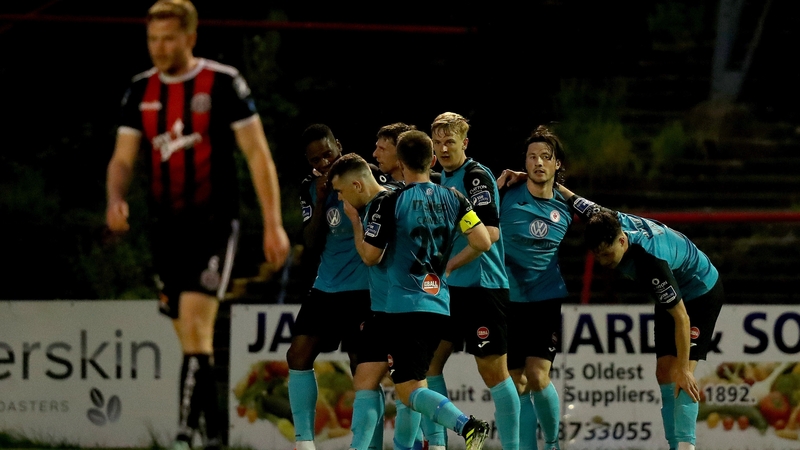 Rovers players celebrate Parkes' late winner