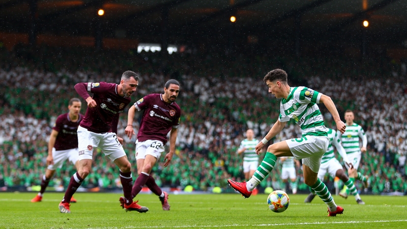 Mikey Johnston running at the Hearts rearguard at Hampden Park