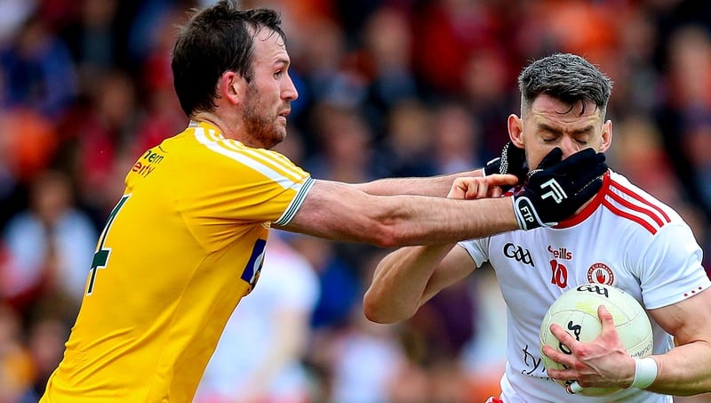 Mattie Donnelly tackled by Patrick Gallagher