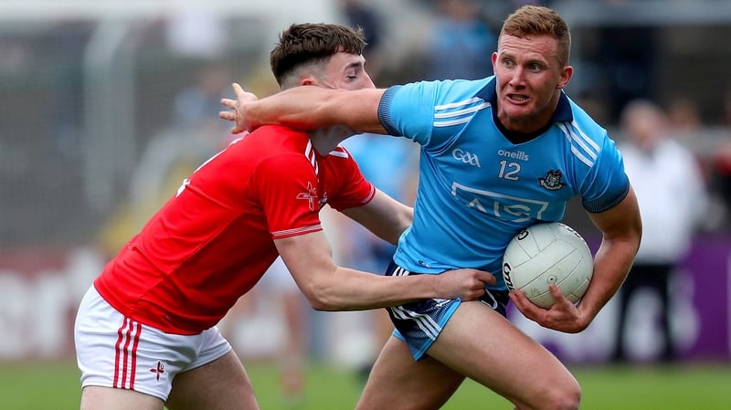Ciaran Kilkenny evades Fergal Donohoe of Louth