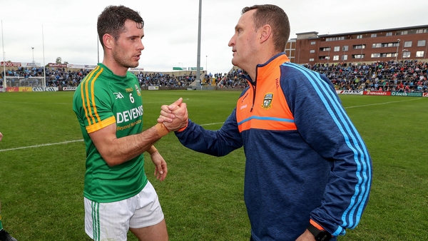 Donal Keoghan and Andy McEntee celebrate after the game
