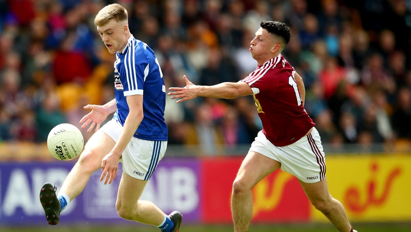 Sean O'Flynn evades the clutches of Westmeath's Ronan O'Toole