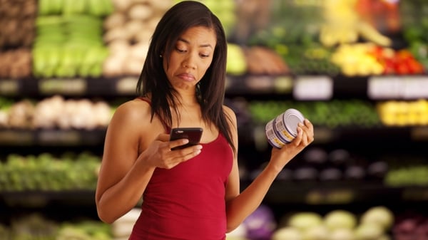 "Shoppers who look at their phones spend more time in the store, look at more products, and buy more things" Photo: Shutterstock/Rocketclips Inc