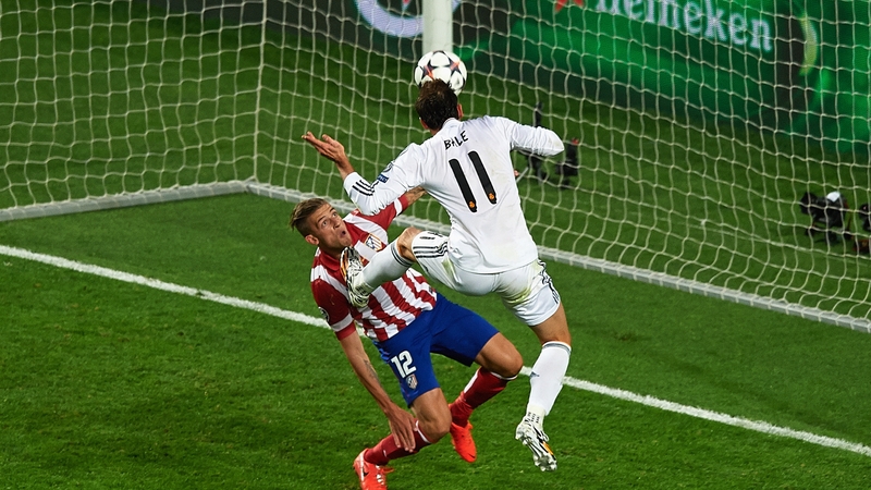 Gareth Bale beats Toby Alderweireld to score Real Madrid's second goal in the 2014 final