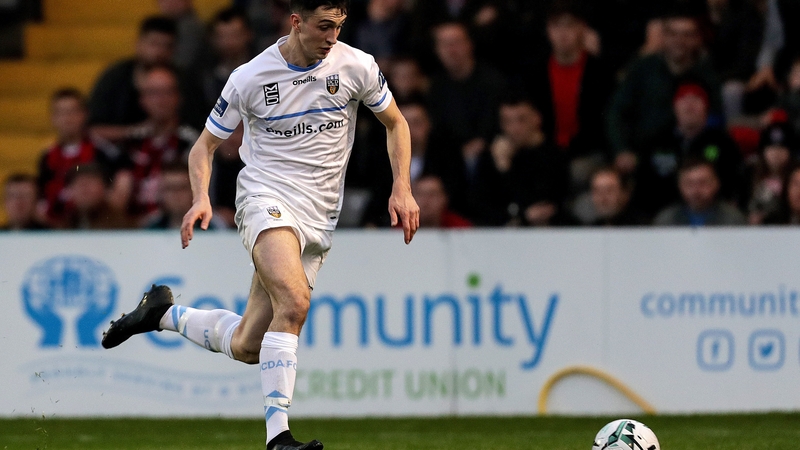 Neil Farrugia in action for UCD