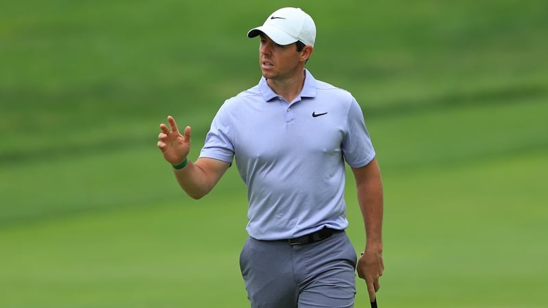 Rory McIlroy finished the day 10 shots adrift of clubhouse leader Ryan Moore
