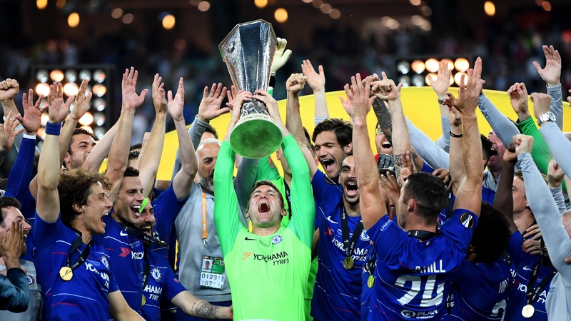 Rob Green (C) lifts the Europa League trophy