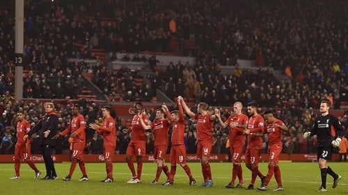Jurgen Klopp leads his players towards the Kop after the 2-2 draw with West Brom on 13 December, 2015
