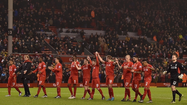 Jurgen Klopp leads his players towards the Kop after the 2-2 draw with West Brom on 13 December, 2015