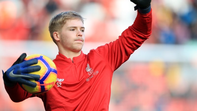 Caoimhin Kelleher warms up before a game at Anfield, Liverpool