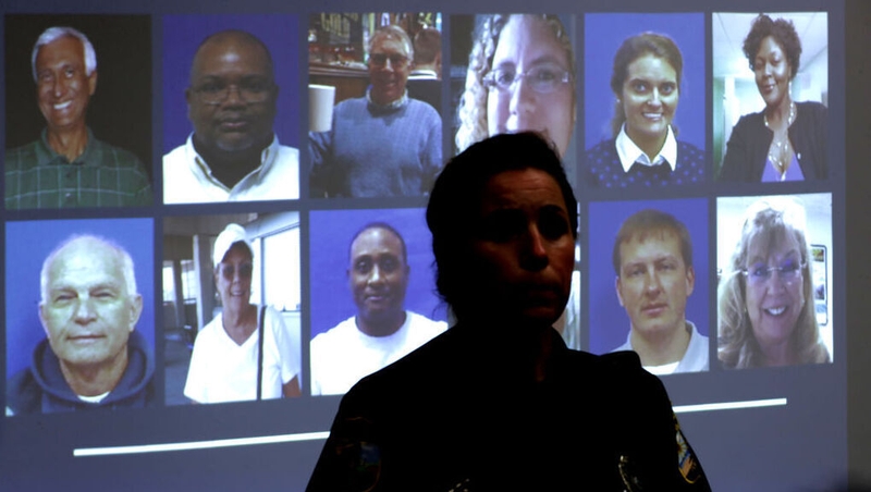 The photographs and names of the 12 victims of the shooting were announced by city officials during a news conference