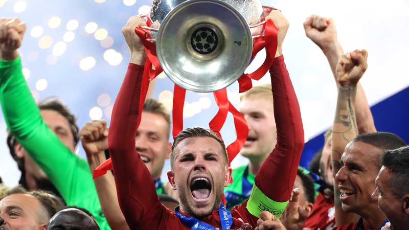 Jordan Henderson lifting the Champions League trophy in 2019