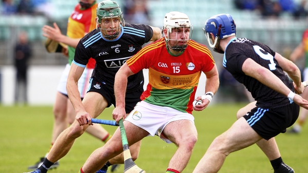 Carlow's Chris Nolan in action against Dublin's Sean Treacy and Chris Crummey