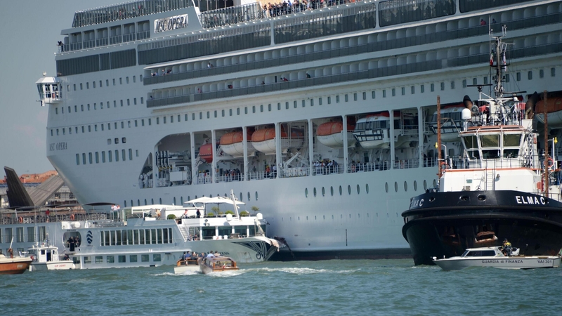 The cruise ship MSC Opera (R) is seen after the collision with a tourist boat in Venice, Italy
