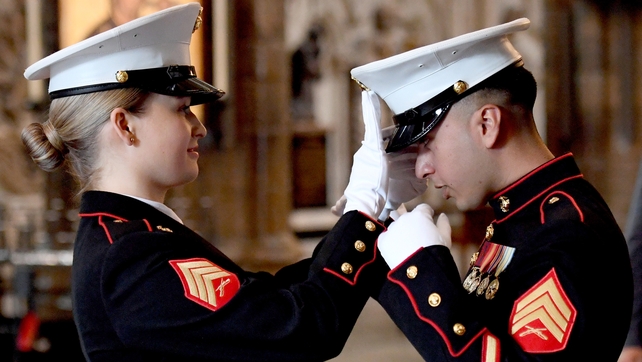 Two US service personnel prepare for the arrival Donald Trump at Westminster Abbey