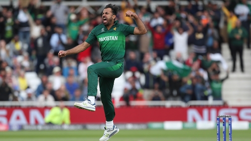 Pakistan bowler Wahab Riaz celebrates after taking the wicket of Chris Woakes