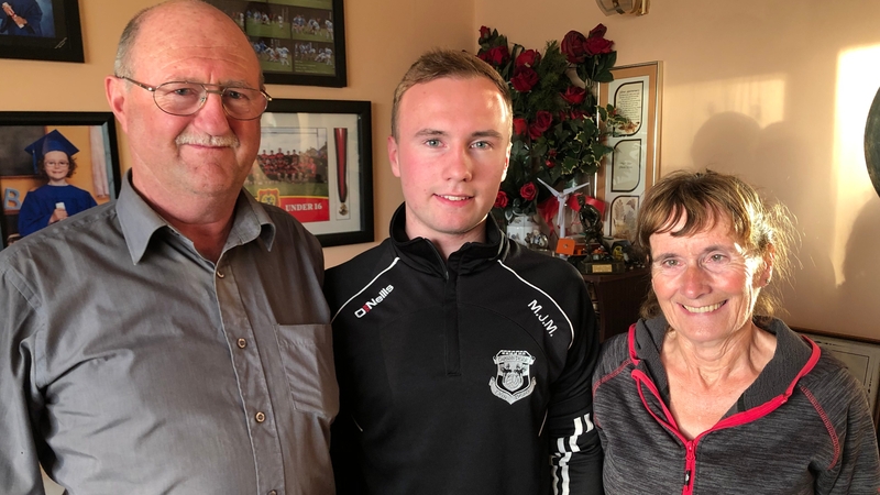 MJ Malone, pictured with his parents, said he would get up a little earlier due to the traffic restrictions