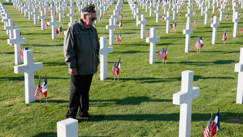 US Veteran Kirt Robbins pays his respects at the American Cemetery in Colleville-sur-Mer