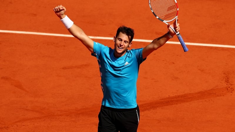 Dominic Thiem celebrates at the end of his marathon match with Novak Djokovic