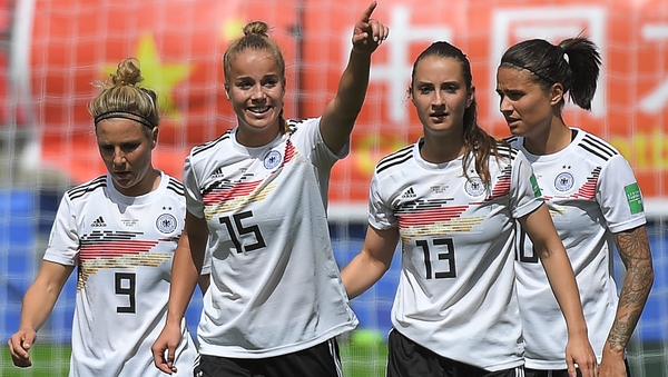 Giulia Gwinn (15) celebrates with her Germany team-mates after scoring the only goal of the game