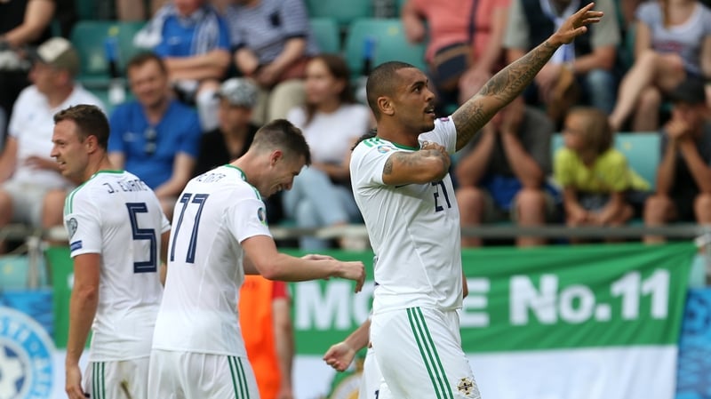 Northern Ireland's Josh Magennis celebrates in front of the large travelling support in Tallinn