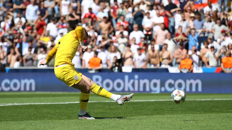 England goalkeeper Jordan Pickford scores a penalty during the shootout