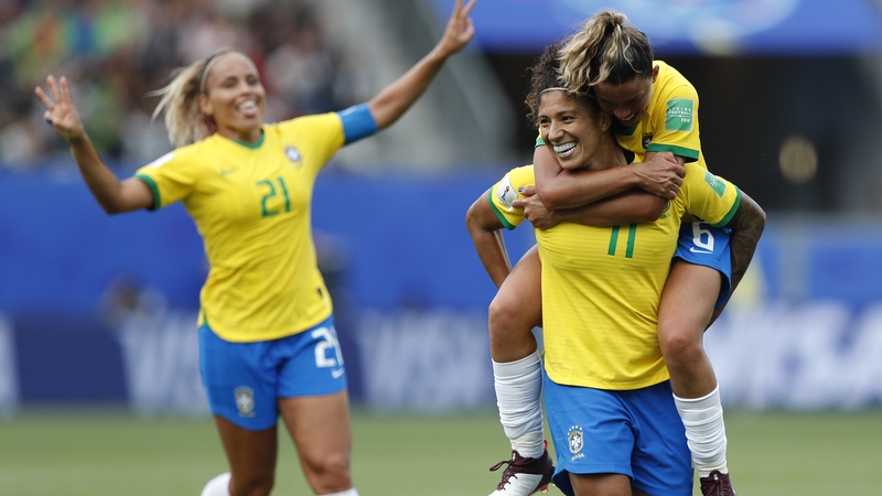 Cristiane (11) celebrates with team-mates