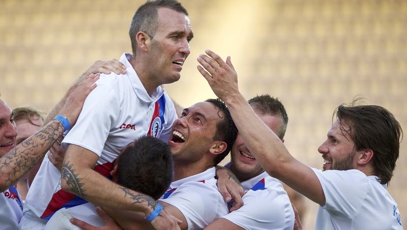 Fernando Ricksen is held aloft during a benefit game in his honour back in 2014