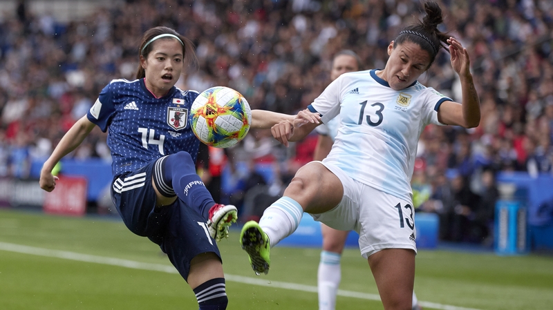 Virginia Gomez of Argentina competes for the ball with Yui Hasegawa of Japan