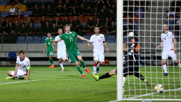 Northern Ireland's Paddy McNair scores