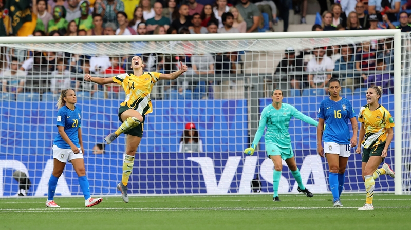 Alanna Kennedy celebrates at the final whistle