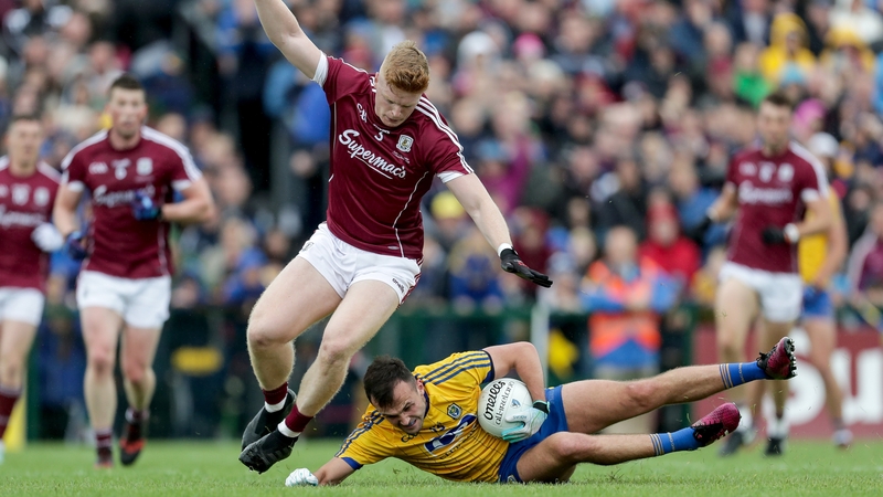 Roscommon's Donal Smith tackled by Sean Andy O'Ceallaigh of Galway during last year's Connacht final
