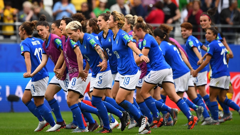 Italian players celebrate their progression to the last 16