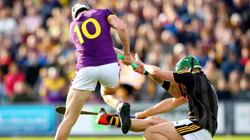 Kilkenny goalkeeper Eoin Murphy tackles Rory O'Connor of Wexford