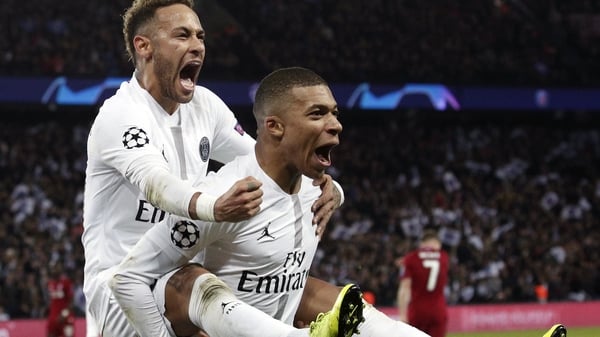 Kylian Mbappe (R) is a wanted man