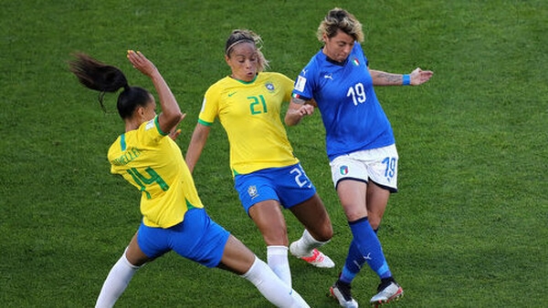 Brazil's Kathellen, Monica and Italy's Valentina Giacinti battle for the ball