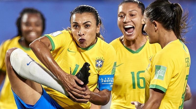 Marta kissed her boot, which bears a gender equality symbol, after scoring against Italy