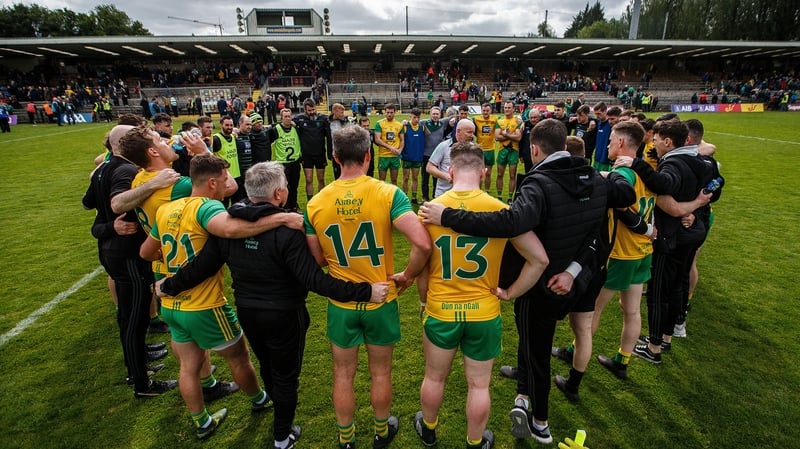 Declan Bonner chats to his team after the Ulster quarter-final win over Fermanagh