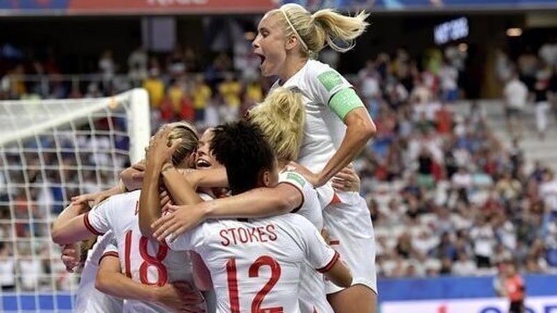 Ellen White celebrates with team-mates