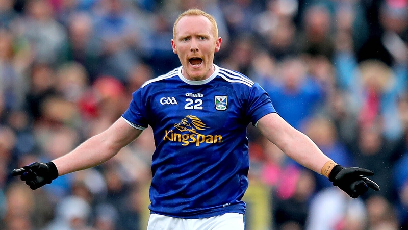 Cavan's Cian Mackey celebrates scoring a point in extra time to force a replay