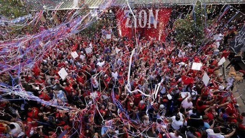New Orleans fans celebrate the arrival of Zion Williamson