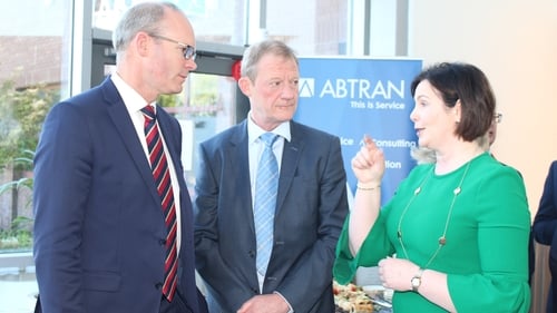 Tanaiste Simon Coveney, Mike Maloney, Executive Chairman of Abtran and Marguerite Sayers, Electric Ireland's executive director at Abtran's headquarters in Cork
