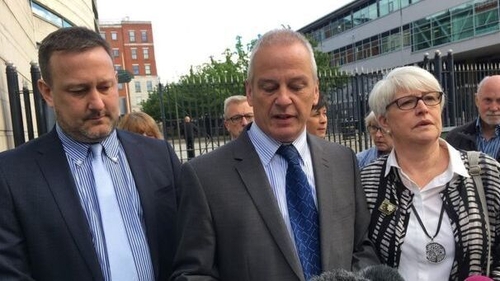 The Roberts family speaking outside the court: brother Gareth and parents Alan and Jennifer