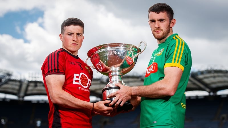 Down's Caolan Taggart (L) and Sean Geraghty of Meath with the Christy Ring Cup
